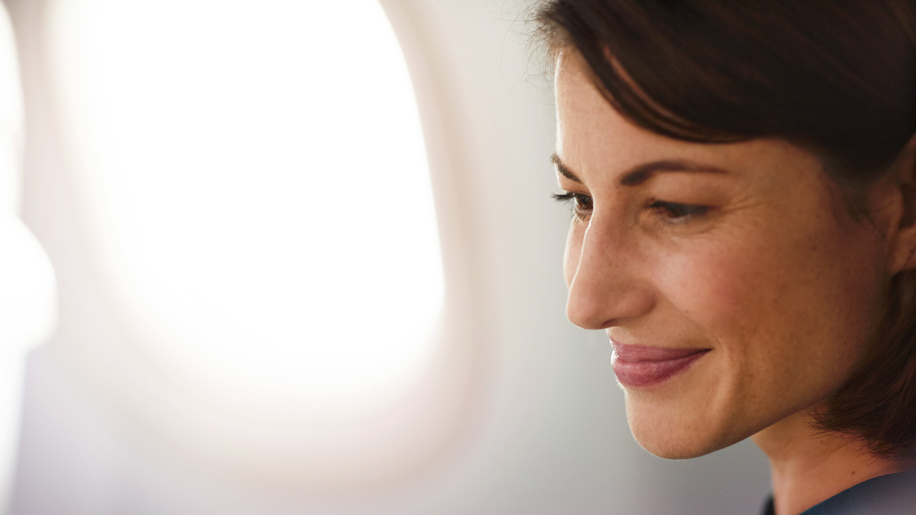 Female passenger enjoys flight